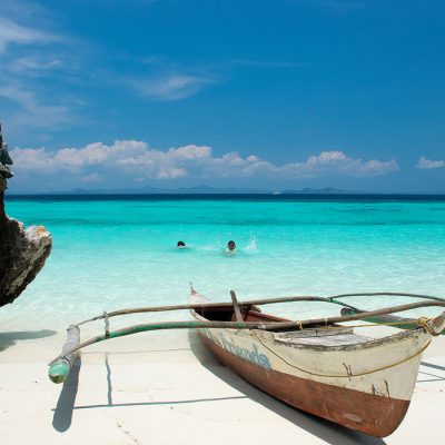 Kids playing in clear water of the Phillipines