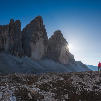 The sun passing behind Tre Cime di Lavaredo