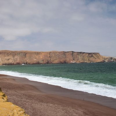 The famous red sand beach of Paracas in Peru