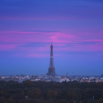 Last bit of pink colors in the Parisian sky with a view of the Eiffel Tower